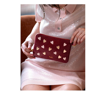 Détail texture cuir upcyclé pochette Frégate